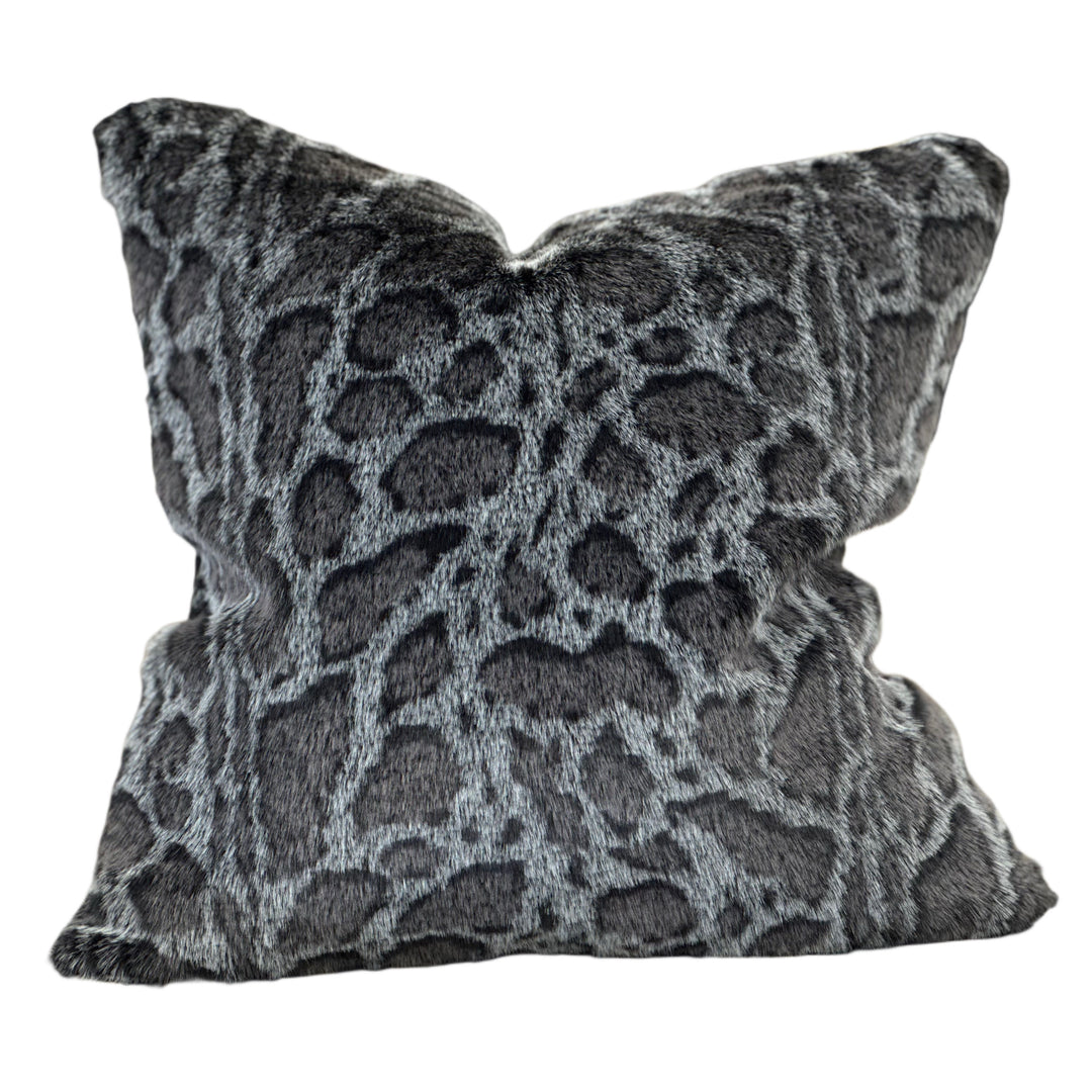 Decorative pillow with a gray and black pattern on a white background