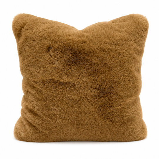 Copper fur pillow on a white background