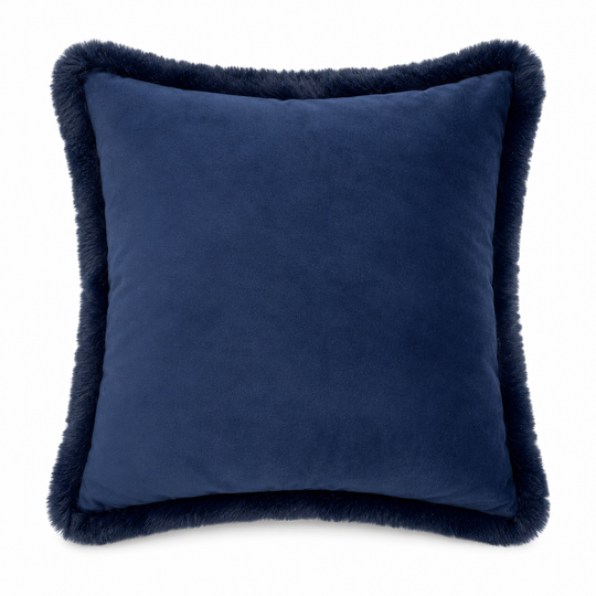 Dark Indigo pillow with fur trim on a white background
