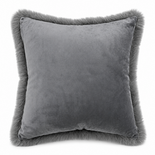Smokey Gray pillow with fur trim on a white background