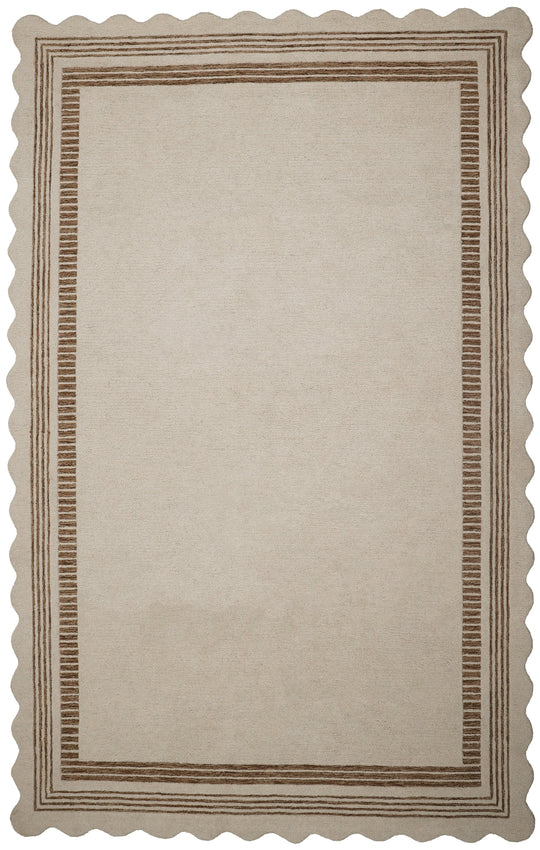 A rectangular beige rug with a scalloped edge and a decorative border pattern in brown, shown flat against a white background.