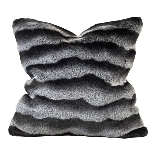 Decorative pillow with stripe pattern on a white background