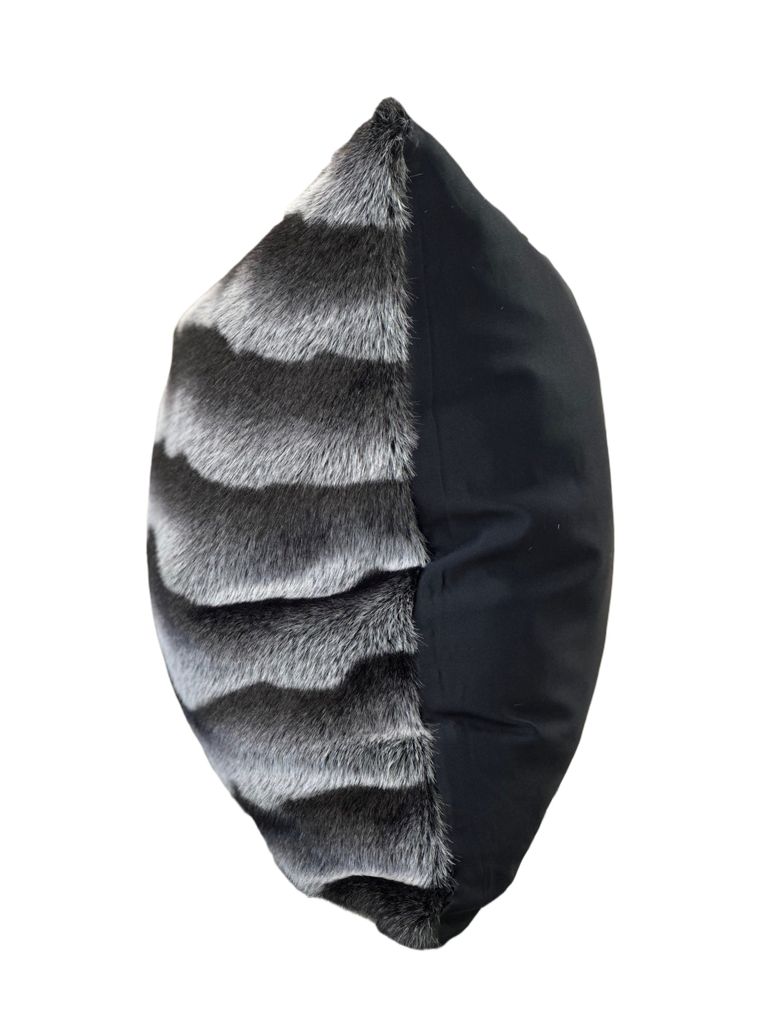 Black and gray striped pillow on a white background