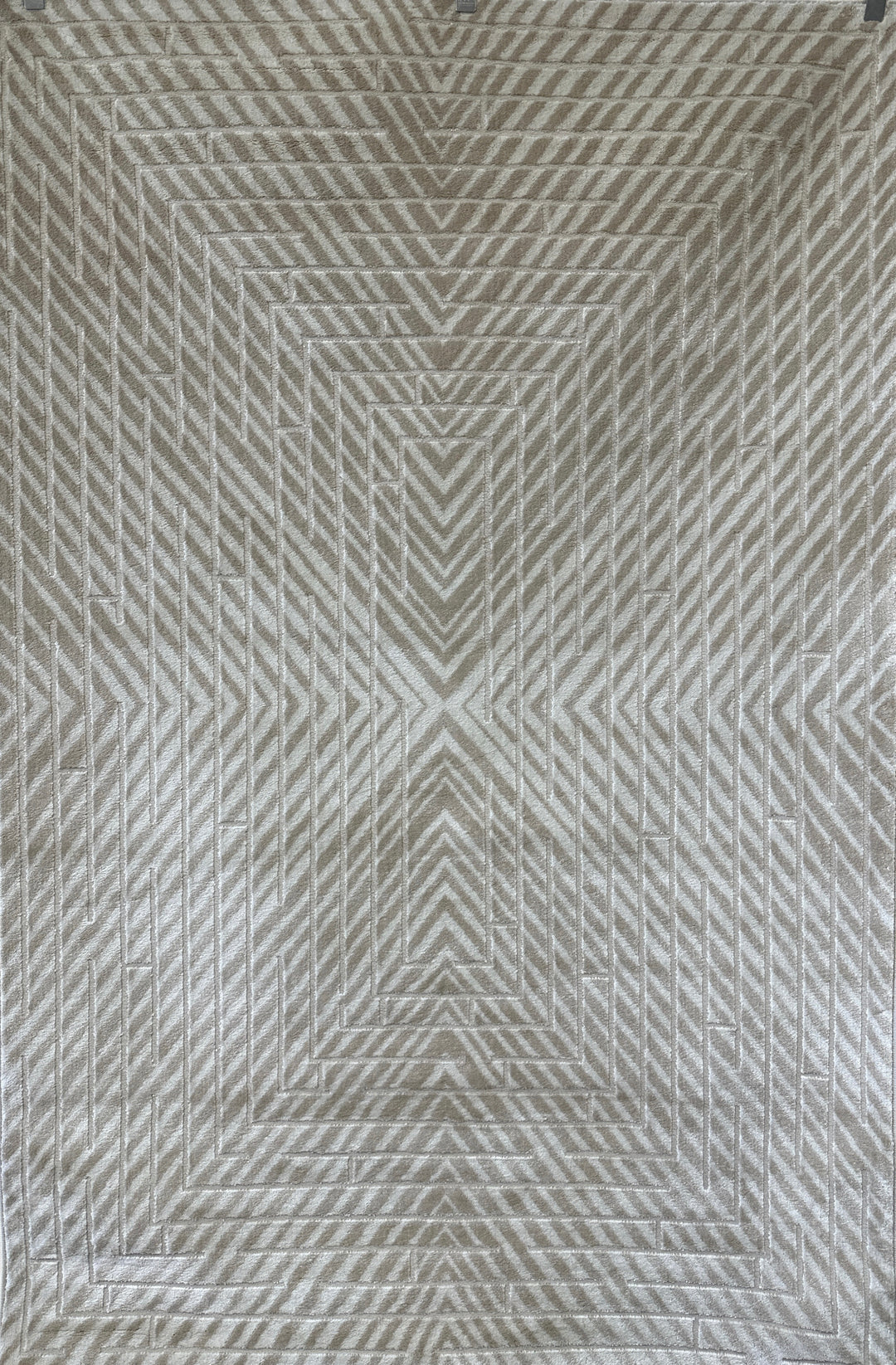 Textured patterned tile with geometric design