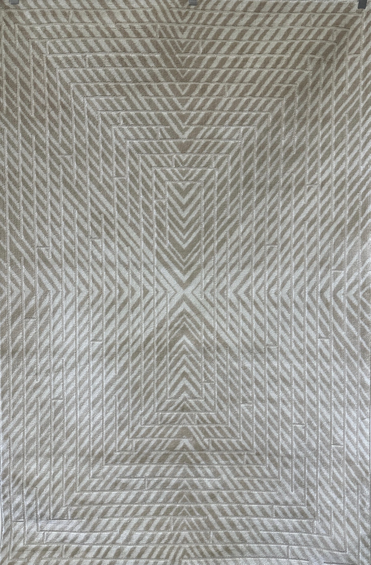 Textured patterned tile with geometric design