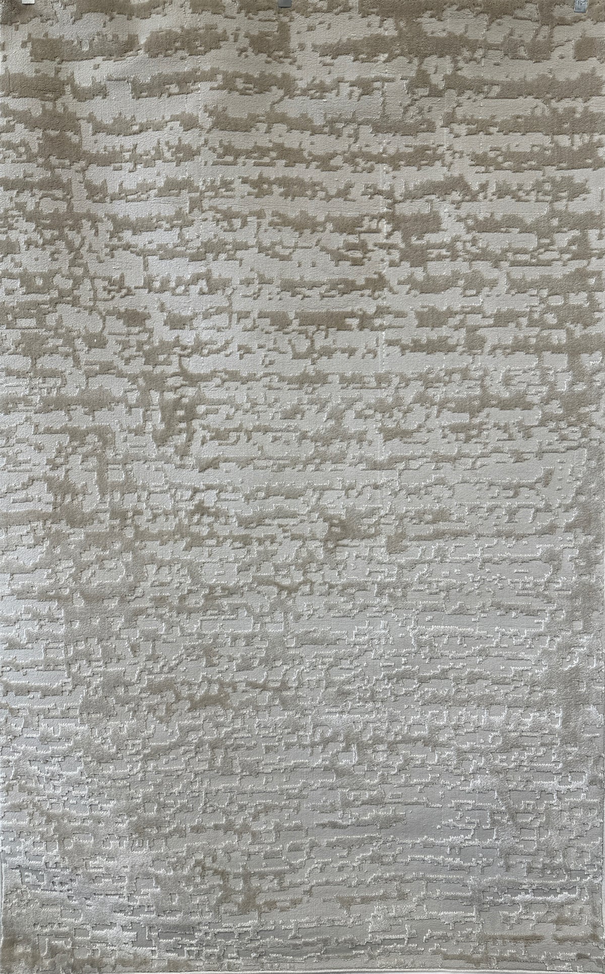 Textured area rug with a neutral color palette