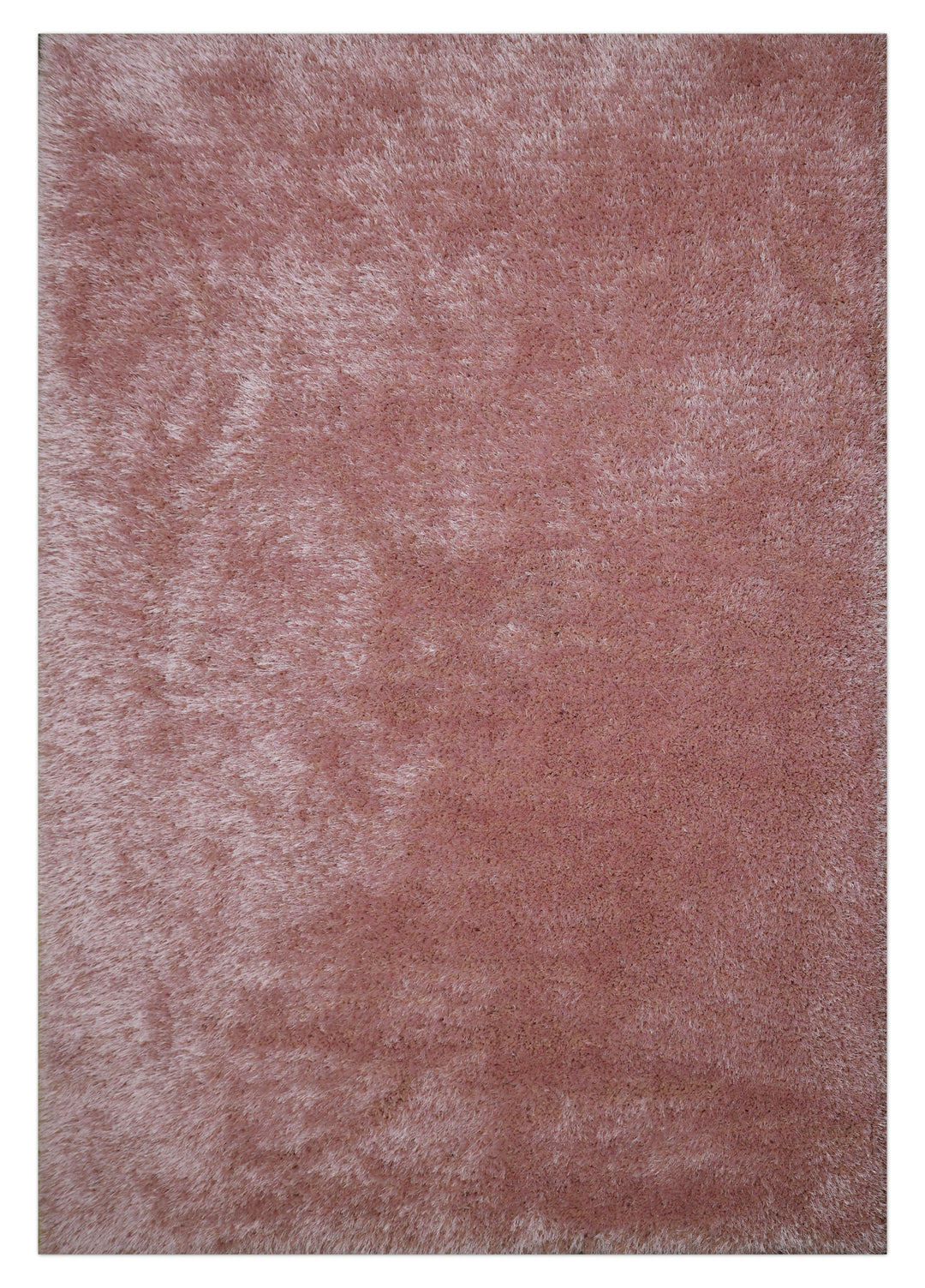 A close-up of a shaggy, textured fabric or rug in a dusty rose pink color, filling almost the entire frame.