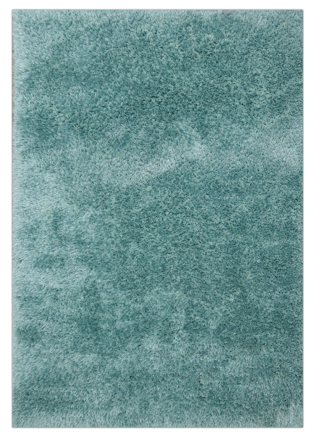 A close-up of a plush, high-pile shag rug in a dusty teal blue-green color, showing the soft texture of the fibers.