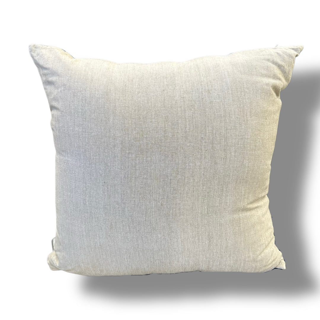 White textured pillow on a white background