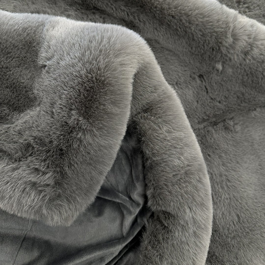 Close-up of a textured gray fabric surface