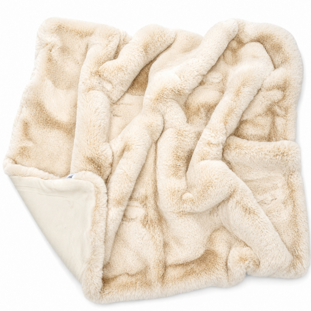 Beige chinchilla faux blanket on a white background