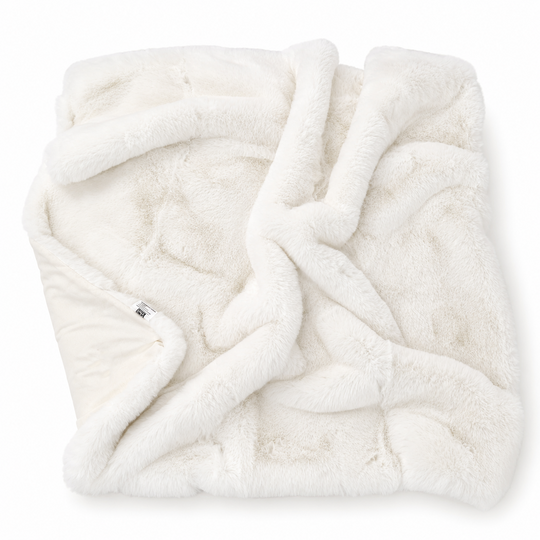 White fluffy blanket on a white background