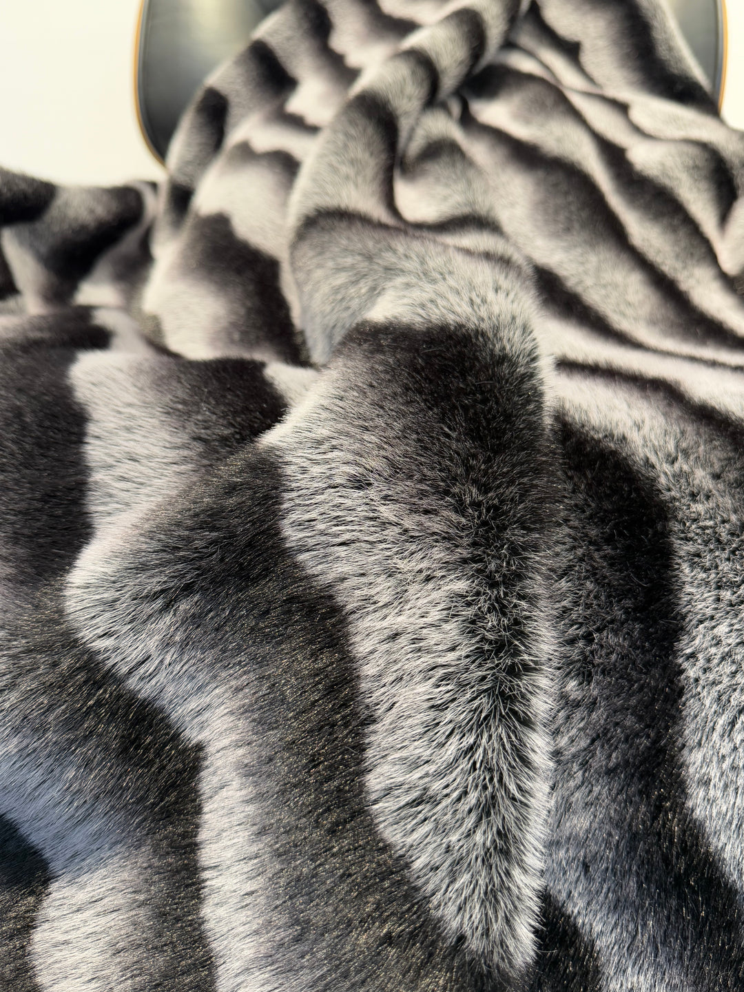 Close-up of a textured gray fabric with a pattern