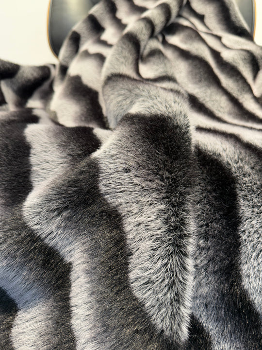 Close-up of a textured gray fabric with a pattern